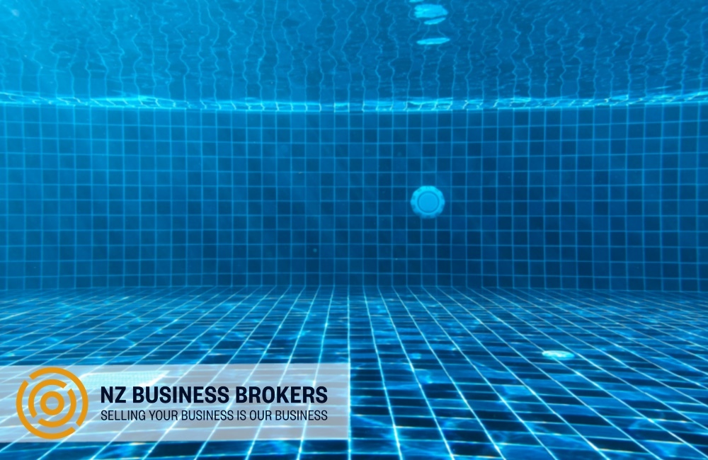 Underwater view of a tiled swimming pool, NZ pool services business