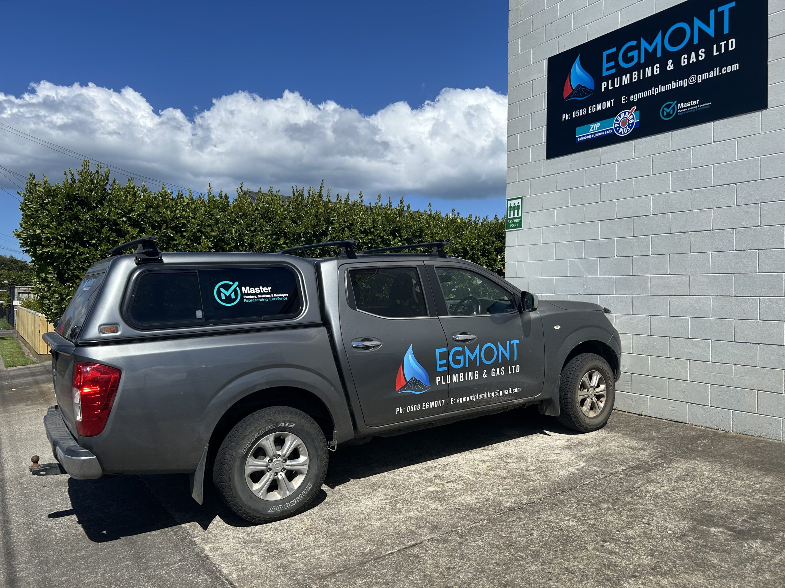 Egmont Plumbing and Gas Ltd branded ute parked outside their North Island regional office
