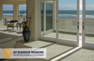 Beachfront home interior with clear untinted windows and ocean views