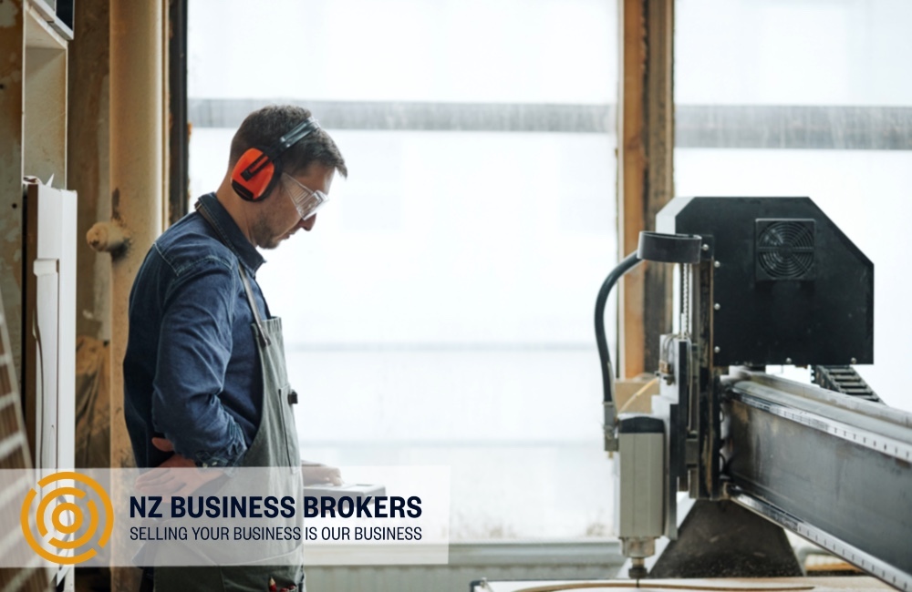 Joiner operating CNC machinery in a Wairarapa joinery and kitchen manufacturing workshop