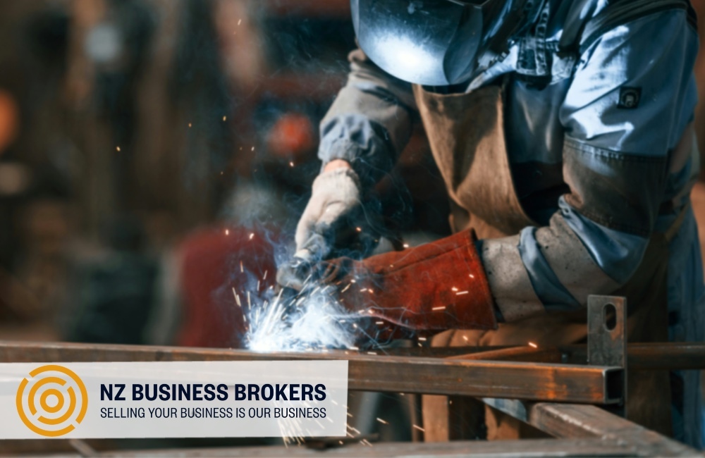 Welder fabricating steel in a Kapiti Coast engineering and fabrication workshop