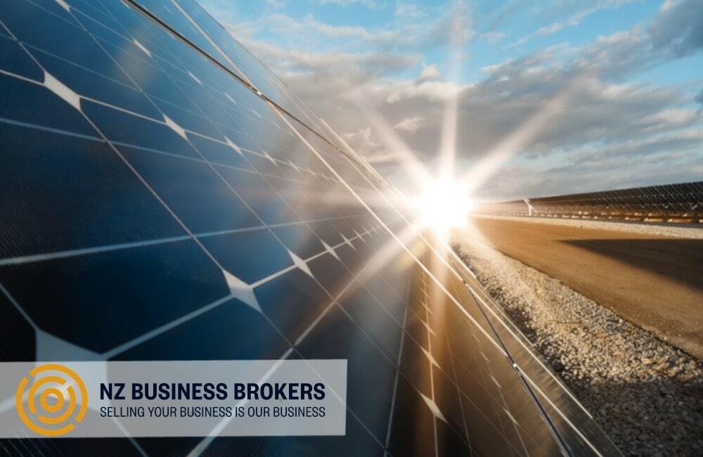 Solar panels reflecting sunlight at a commercial solar installation