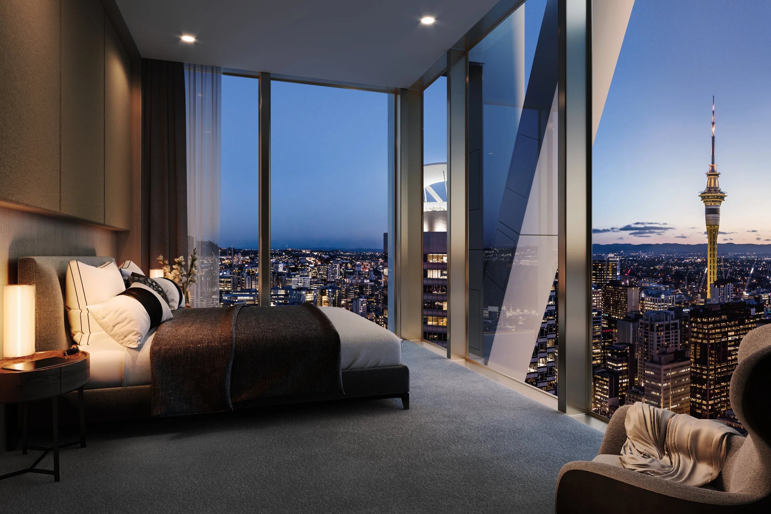 Premium Auckland hotel room with Sky Tower views at night